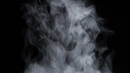 White Steam Ascends from Glass Pot, close-up.