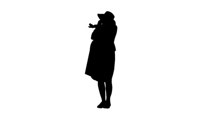 Pregnant woman standing and talking by phone in summer, Alpha Ch