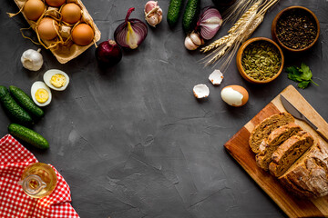 Obraz na płótnie Canvas Dinner table with fresh homemade food - eggs, bread, potatoes