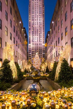 New York City, NY, USA - December 07, 2018: Christmas season decorations at Rockefeller Center Plaza with Christmas tree and holiday lights. Fifth Avenue, Midtown Manhattan