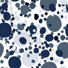Random little and big rock silhouettes seamless pattern. Navy and blue colored masonry ornament on white background.