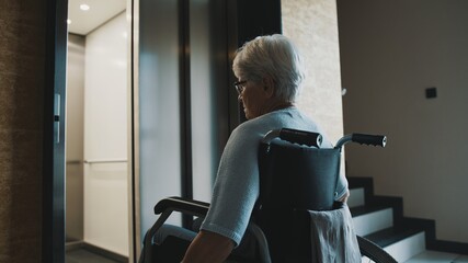 elderly disabled woman using the lift in the wheelchair. High quality photo © CameraCraft