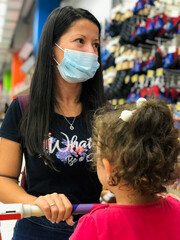 Young Woman Wear Face Mask Shopping In Supermarket Store With His Daughter, New Normal Concept