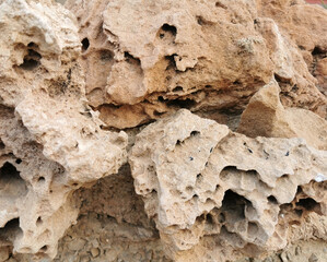 Texture of weathered sandstone rock. Outdoor background.