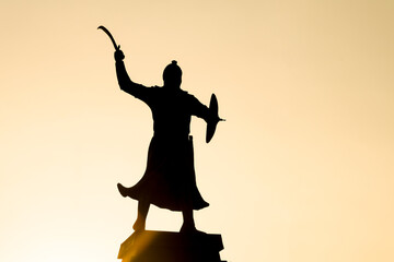 silhouette of warrior model with sword and shield in hand