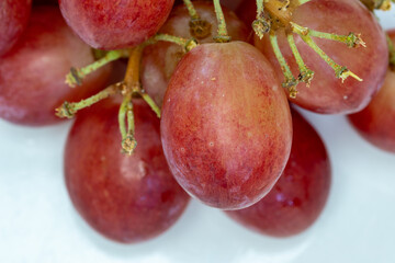 Close up of ripe and dark red grapes
