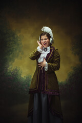Music with headphones. Modern trendy look, portrait of renaissance period beautiful woman. Retro...