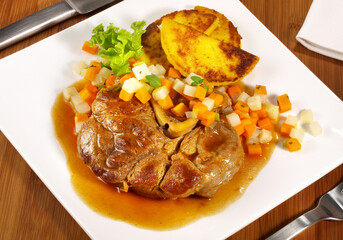 Ossobuco Veal Shank Slices with Polenta and Vegetables