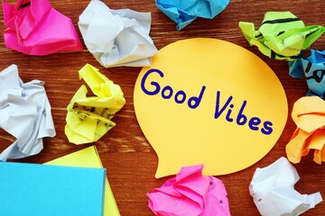 Good Vibes inscription on the sheet.