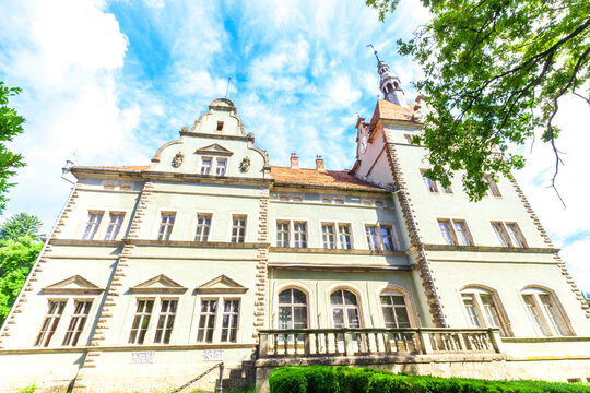 Old Shenborn Palace in Carpathians region by blue sky, Ukraine