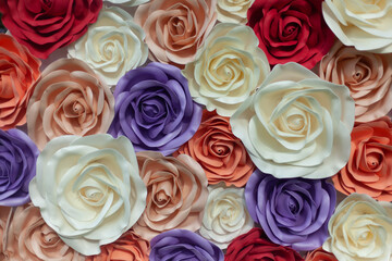 Texture of large roses. Artificial flowers for the background. 