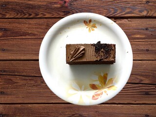 Plain Chocolate Cake being served in a plate - food and products