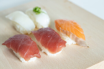 Japanese dish Sushi on wooden plate