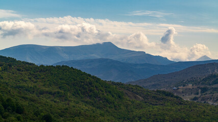 Mountains covered with dense green forest