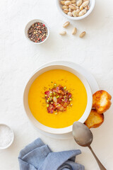 Cheese cream soup with bacon and pistachios. Healthy eating. Recipe.