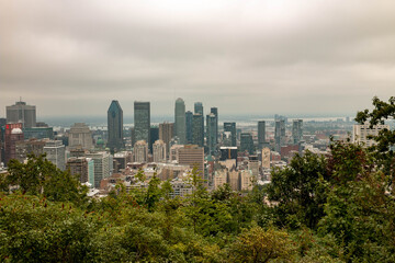 Fototapeta na wymiar Montreal skyline view from the popular Mont Royal Lookout