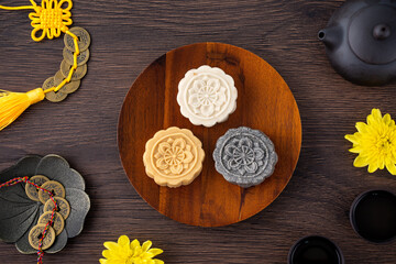 Colorful beautiful moon cake, mung bean cake, Champion Scholar Pastry cake for Mid-Autumn festival traditional gourmet dessert snack, top view, flat lay.