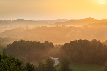 foggy morning in the Piedmontese valley of Mondovì