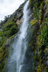 Waterfall from the mountain in free fall in Giron, Ecuador