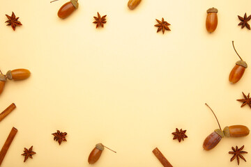 Obraz na płótnie Canvas Autumn composition. Acorn, pine cone, anise star. Flat lay, top view, copy space