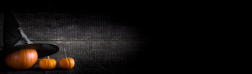 Halloween pumpkin on wooden background