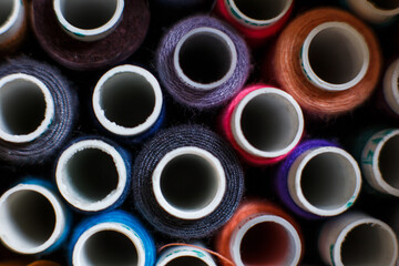 closeup set of skeins of multi-colored sewing thread.Tailor industry