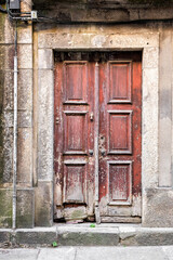 Derelict Ornate Wooden Doors Bordered By Stone, Braga, Portugal 