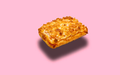 Sweet cookie with shadow at the bottom isolated on pink background.