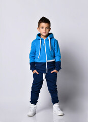Little boy model in sports tracksuit portrait