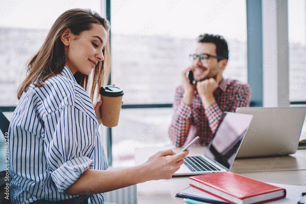 Aufkleber smart casual female employee with coffee to go in hand connecting to to office internet for installi