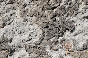Old dirty spotty concrete wall.