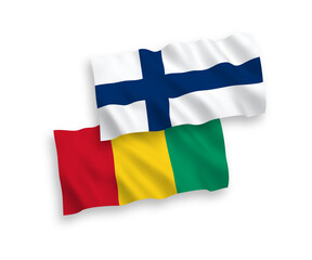 Flags of Finland and Guinea on a white background