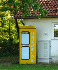 Umkleide, Telefonzelle