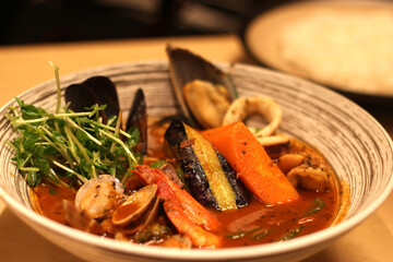 Close up of a bowl of delicious curry seafood, Japanese food, soft focus