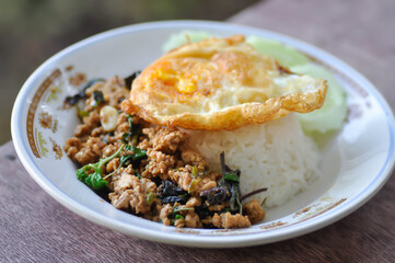 stir fried pork with chili paste, holy basil and fried egg