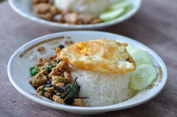 stir fried pork with chili paste, holy basil and fried egg