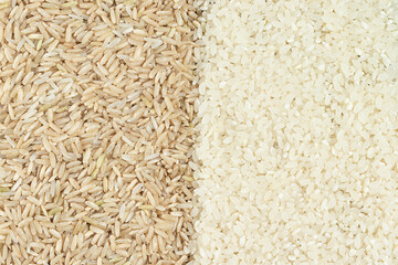 Food background of brown raw rice and white round rice for healthy nutrition