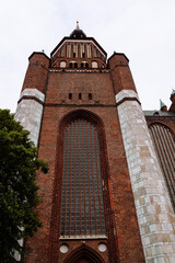 Fototapeta na wymiar Exterior view of St. Mary Church in Stralsund. Low angle view of the main facade
