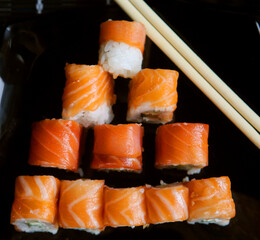Japanese sushi on black plate