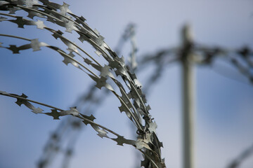 barbed wire on a fence, close up