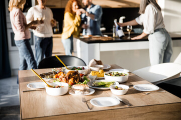 Beautiful served table with food in a cozy home