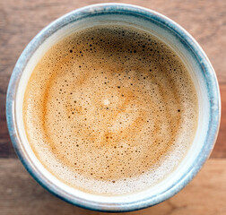 creamy a a hot cup of Coffee