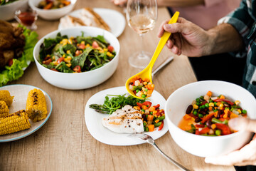 White plate with delicious food on a festive table