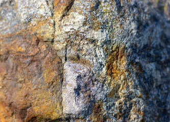 Unpolished granite surface. Warm sunlight. Beautiful background. Concept image.