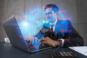 Businessman in office working with laptop, world map planet earth hologram, typing computer. Double exposure.