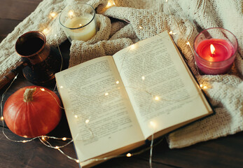 Naklejka na ściany i meble still life with candle and books