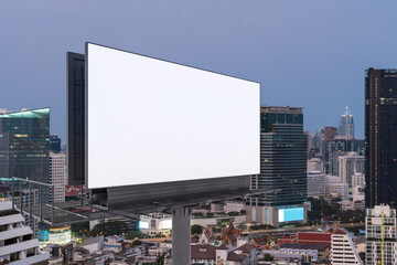 Blank white road billboard with Bangkok cityscape background at sunset. Street advertising poster, mock up, 3D rendering. Side view. The concept of marketing communication to promote or sell idea.