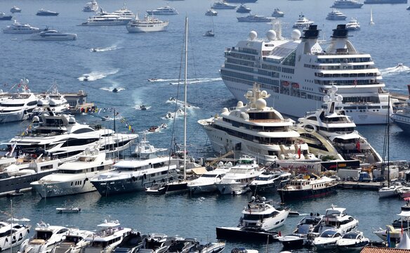 Plenty of yachts of different sizes in Monte Carlo during Formula 1 race in last weekend of May 2018. The Circuit consists of the city streets and La Condamine.