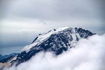 Plakat snow covered mountain in Caucasus, Russia