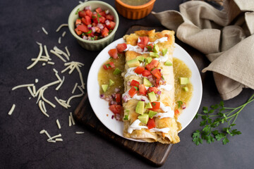 Honey lime chicken enchiladas with toppings